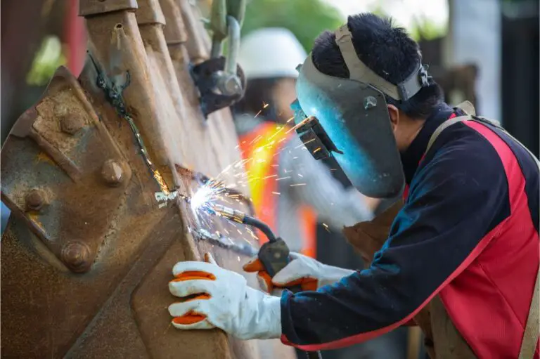 Welder is welding metalwork
